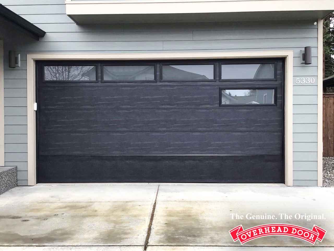 Garage Door Panel Repair service by Overhead Door™ technician