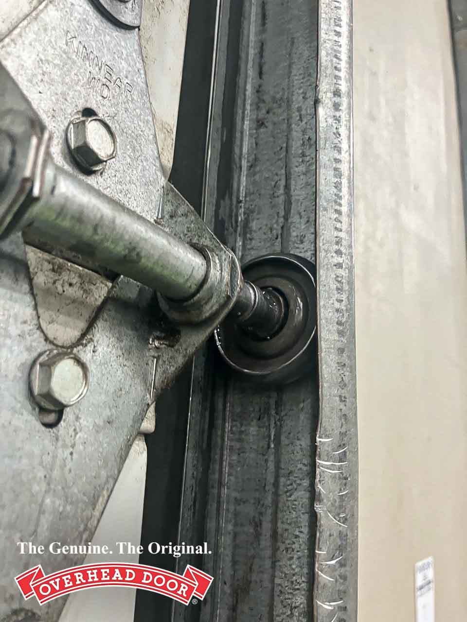 Garage Door Roller Repair service by Overhead Door™ technician