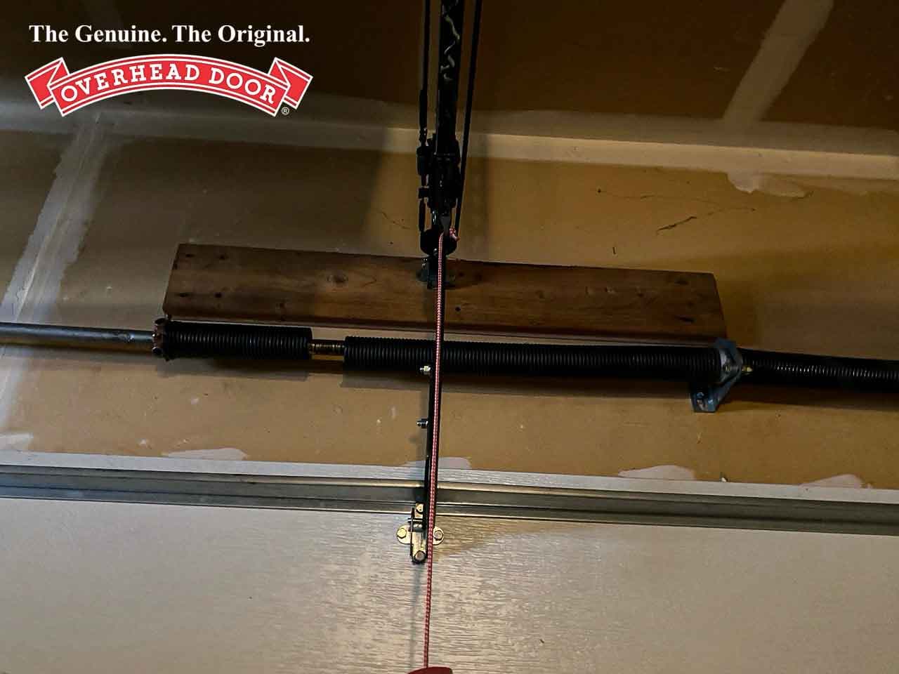 Garage Door Spring Repair service by Overhead Door™ technician